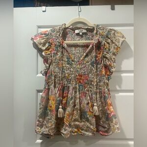 Blouse with tie tassels